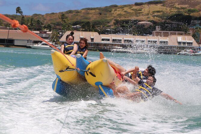 Combo Banana Boat Ride and Bumper Tube Ride in Hawaii - 15-minute bumper tube ride: faster stability practice over the wake