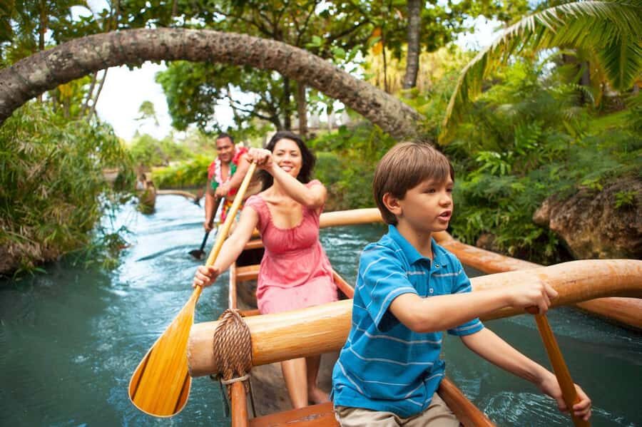 Oahu: Islands of Polynesia and "HA: Breath of Life Show" - The Canoe Pageant: performers from every island on the water