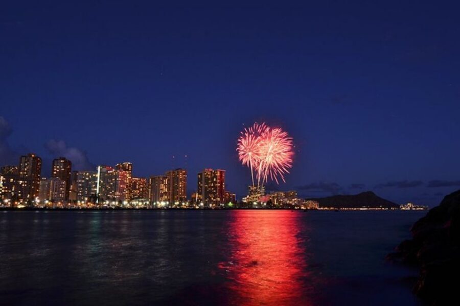 Oahu: Waikiki Friday Night Fireworks Catamaran (Wahine Koa) - The 55-ft sailing catamaran vs the 65-ft power catamaran