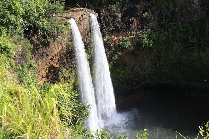 One-Day Tour Hawaii Movie Tour: Island Hopping from Oahu to Kauai - Daniel K Inouye Lighthouse and Lilo & Stitch: a calmer, family-friendly finish