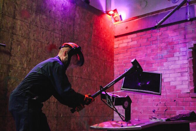 Rage Room Experience in Hawaii - Safety briefing and suiting up: coveralls and the “anger breaker” system