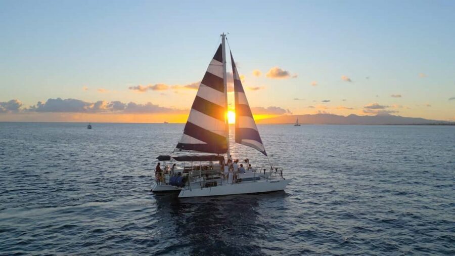 Waikiki: Sunset Swim & Sailing Experience - Onboard comfort on Hokulani: shade, bathrooms, and space that actually helps